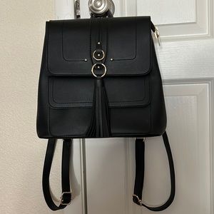 Convertible leather backpack/ over the shoulder purse